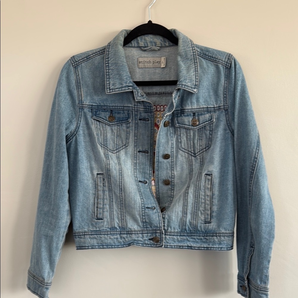 Bohemian style embroidered back denim trucker jacket by Stitch Play. Size large.